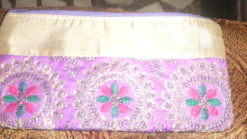 A Violet Colour Pouch With Embroidery