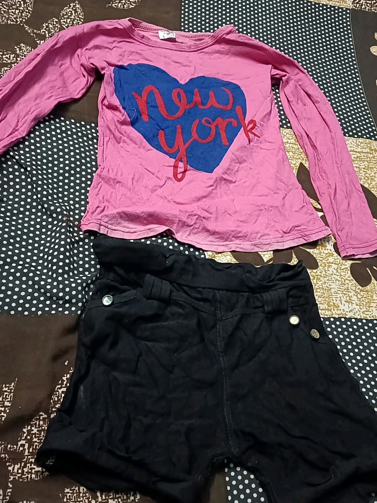 Pink Top And Black Shorts
