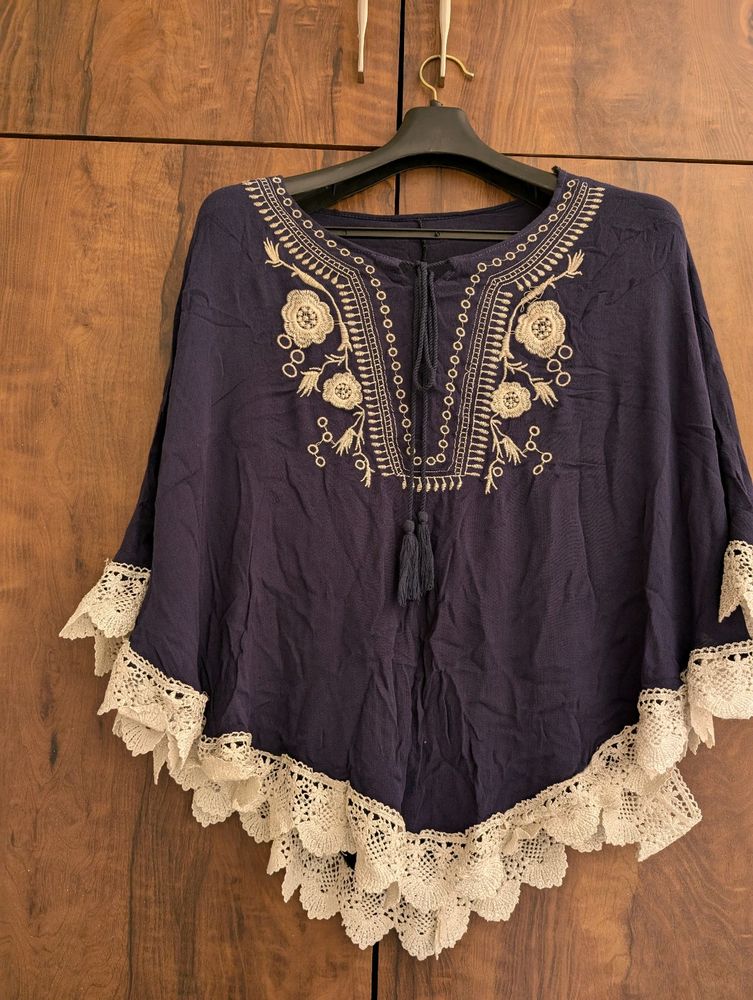 Very Cute Cape Top With White Embroidery