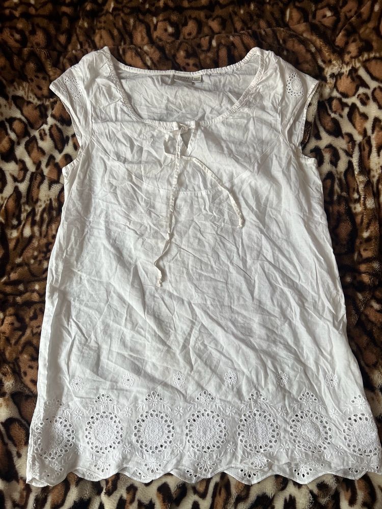 White sleeveless top