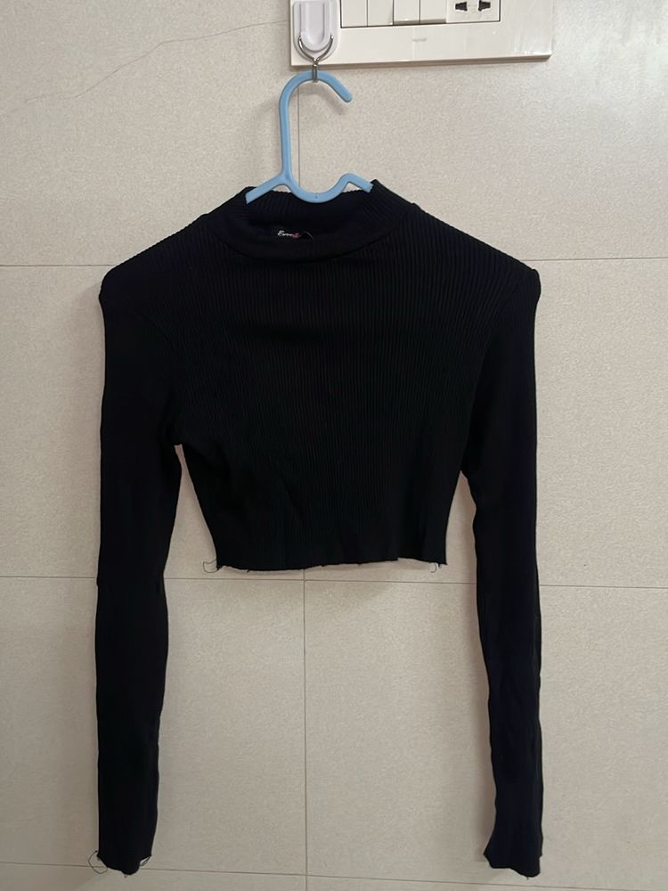 Cropped ribbed turtleneck top