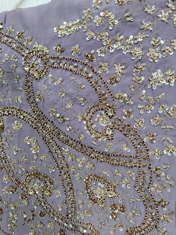 Beautiful detailed work saree purple for weddings and functions