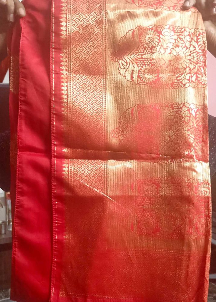 Banarasi Silk with Readymade Blouse.