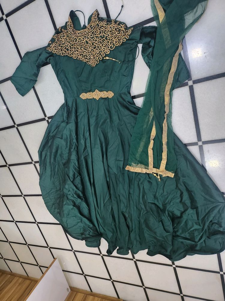 Luxurious Silk Dark Green Gown With Golden Stone