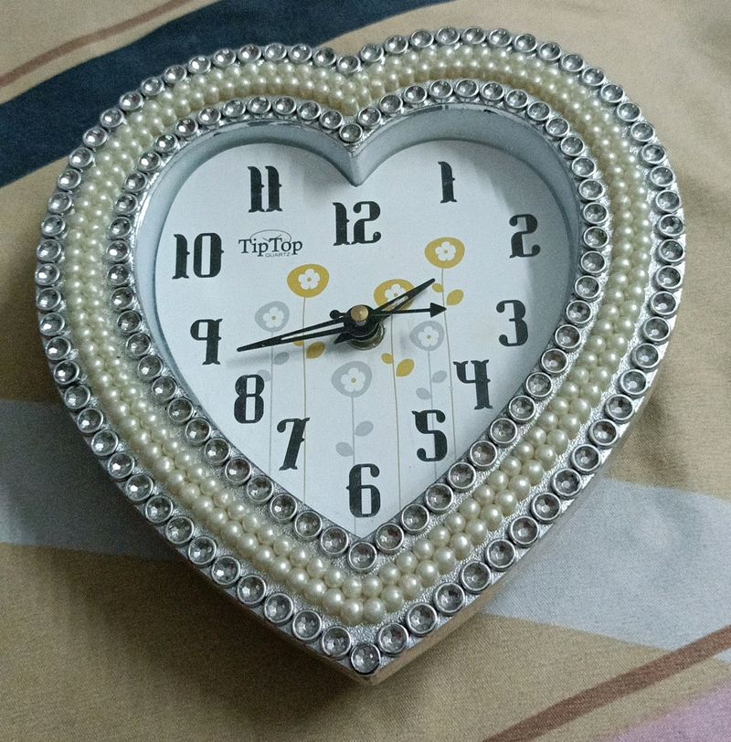 Beautiful heart shaped wall clock or table cloc