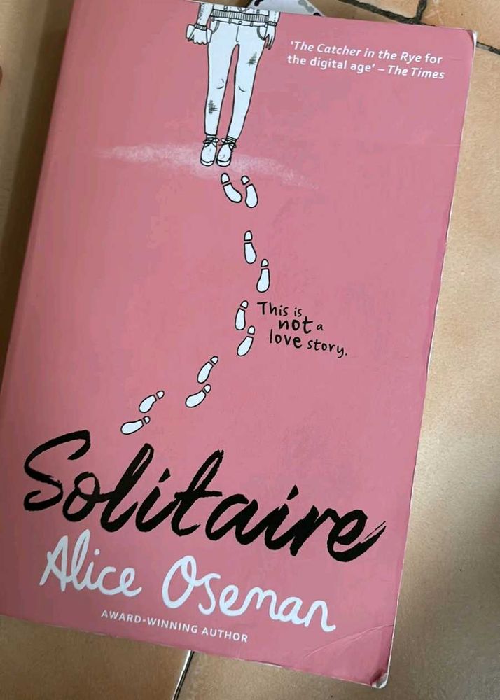 Solitaire Paper Back Book