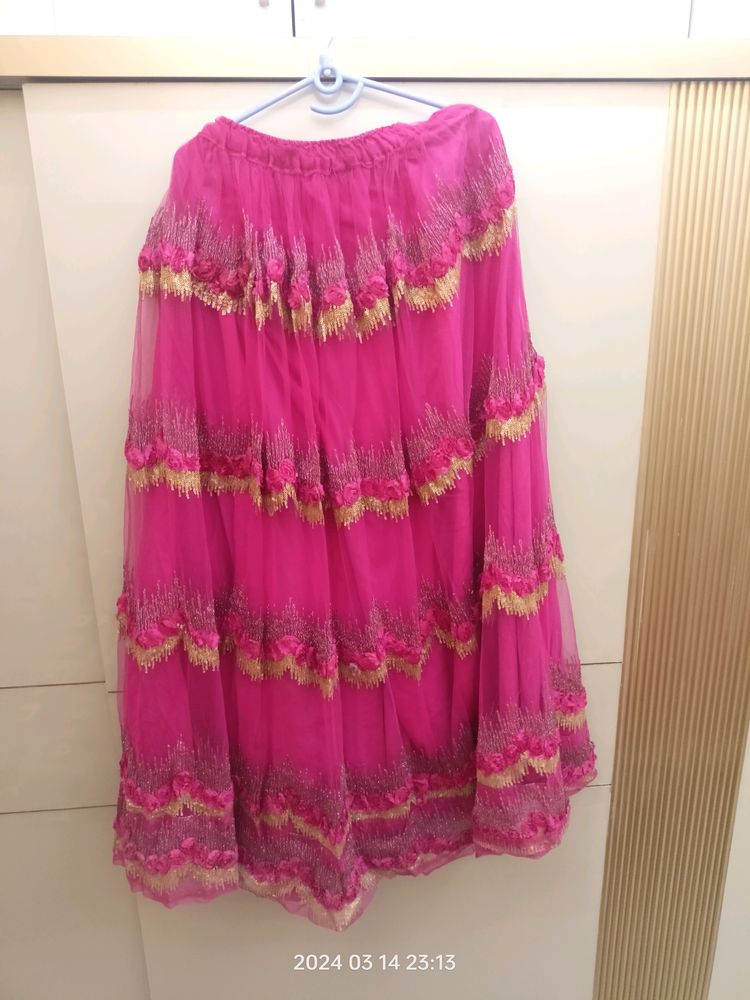 golden choli and dark pink ghaghra with duppatta