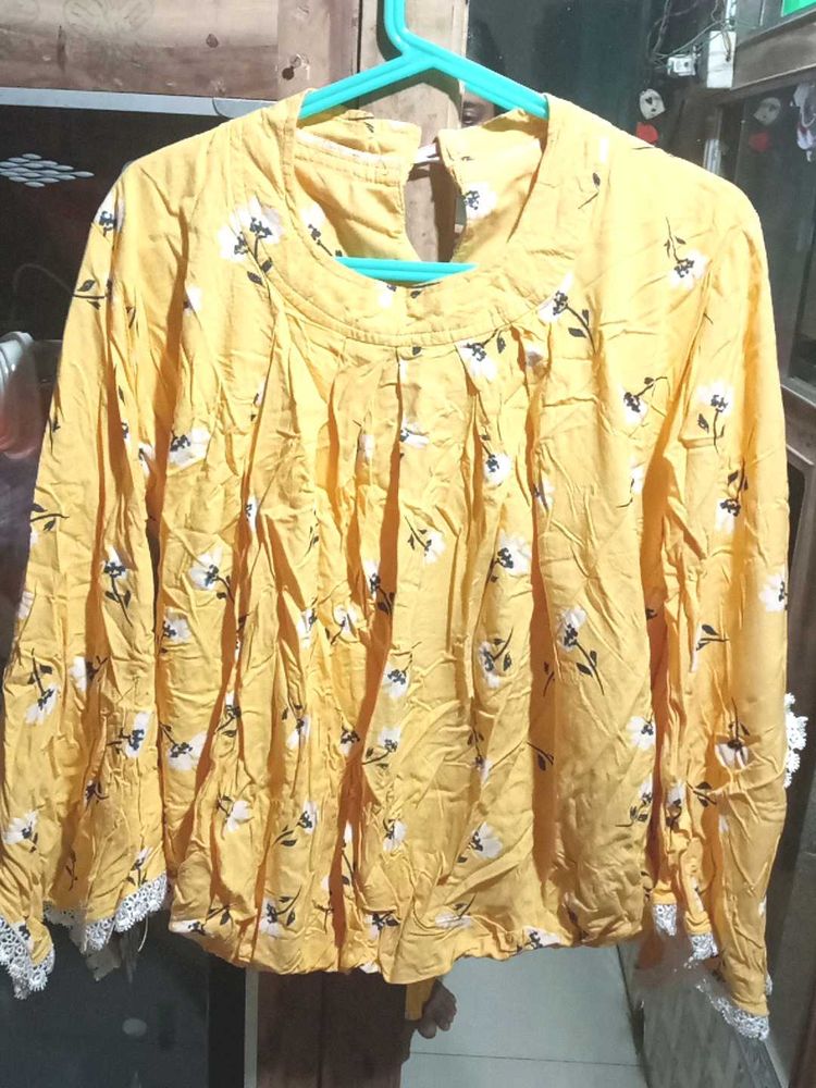 A Very Beautiful Blouson Top In Yellow Colour