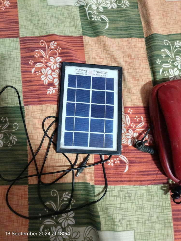 Solar Plate With Telephone As Freebies