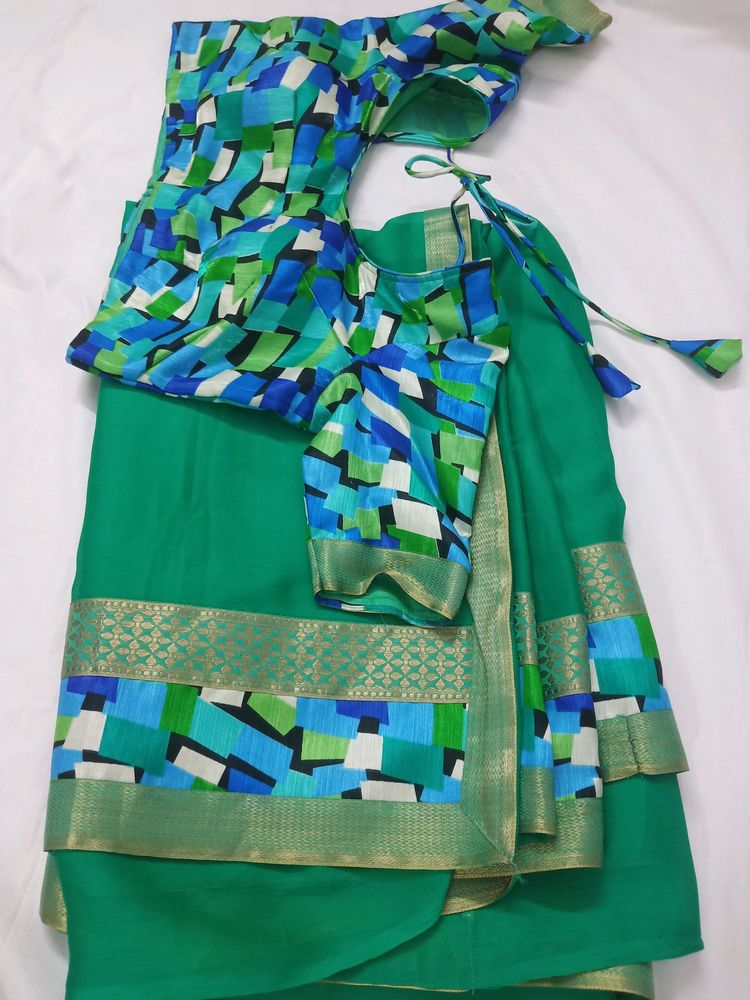 "Elegant Green  Saree with Vibrant Mosaic Blouse