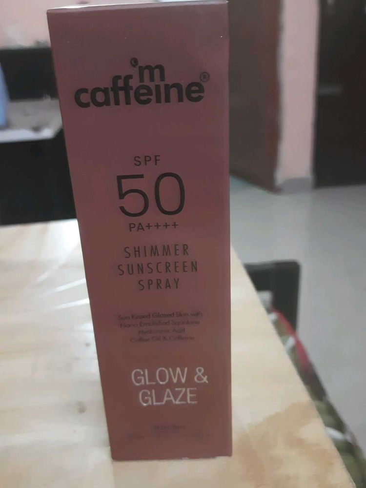 A shimmer sunscreen spray with Spf50 ,PA++++