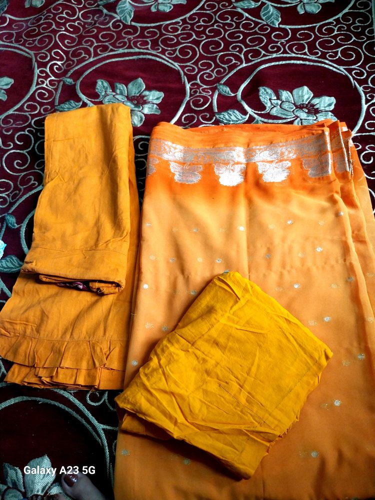 Orange 🍊 clr saree 🥻 goldn work with blouse