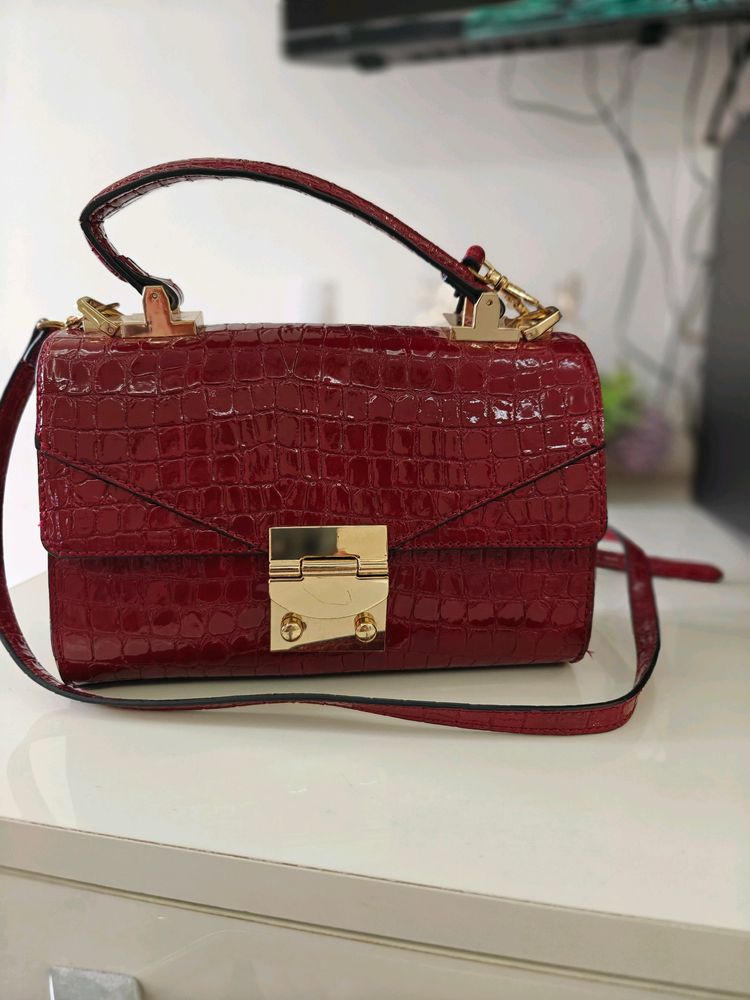 Aldo burgandy/Maroon Sling Bag