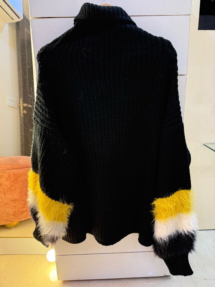 Feathered Sleeve High Neck Sweater