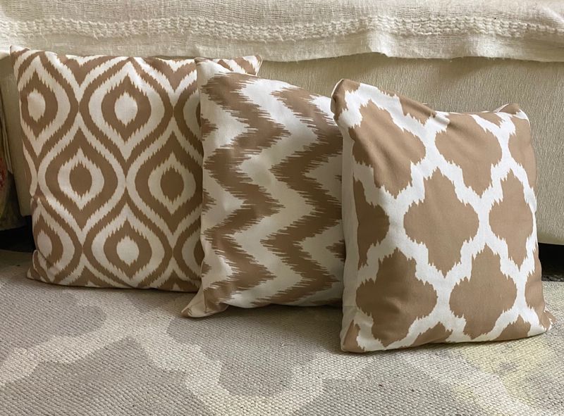 3 Cushions With Covers