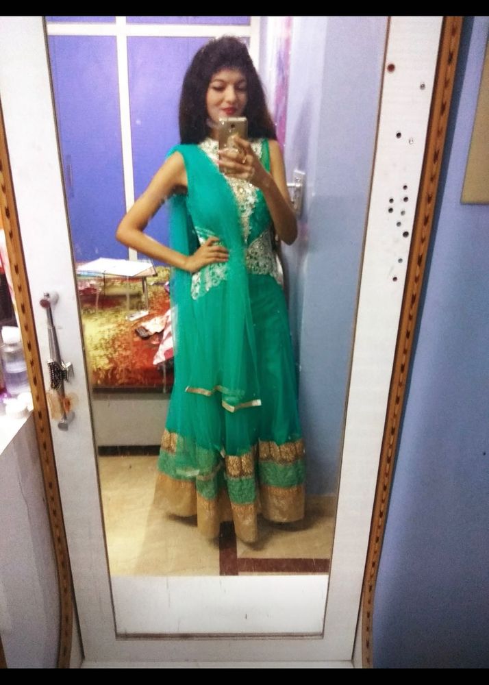 Green Vibrant Heavily Embellished Ethnic Gown