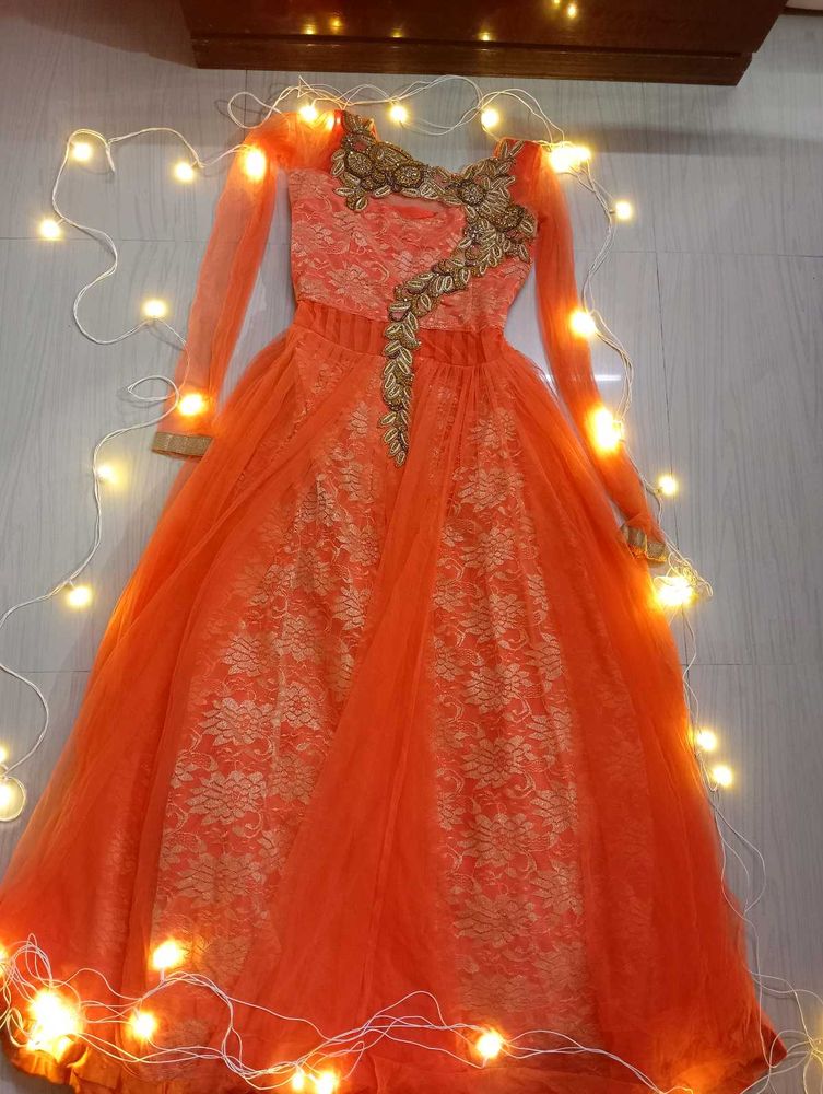 Orange color embroider gown for Women