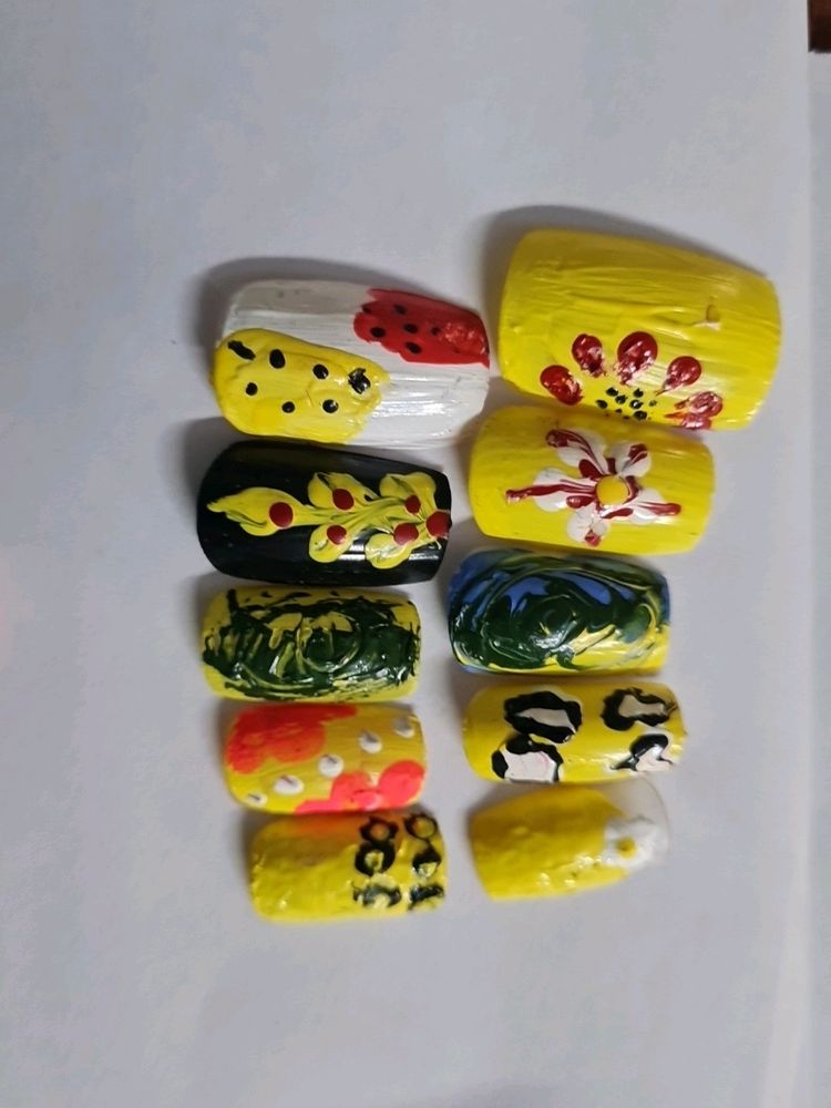 Yellow Colour Artificial Nail Is Available.