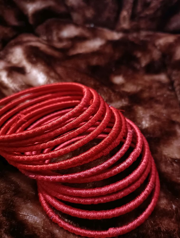 hand made silk thread  bangles. Colour - bright re