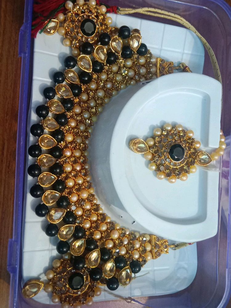 Very Gorgeous Golden And Black Color  Necklace With Earrings And Mangtika