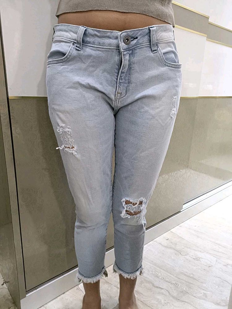 Ripped Cropped Blue Jeans