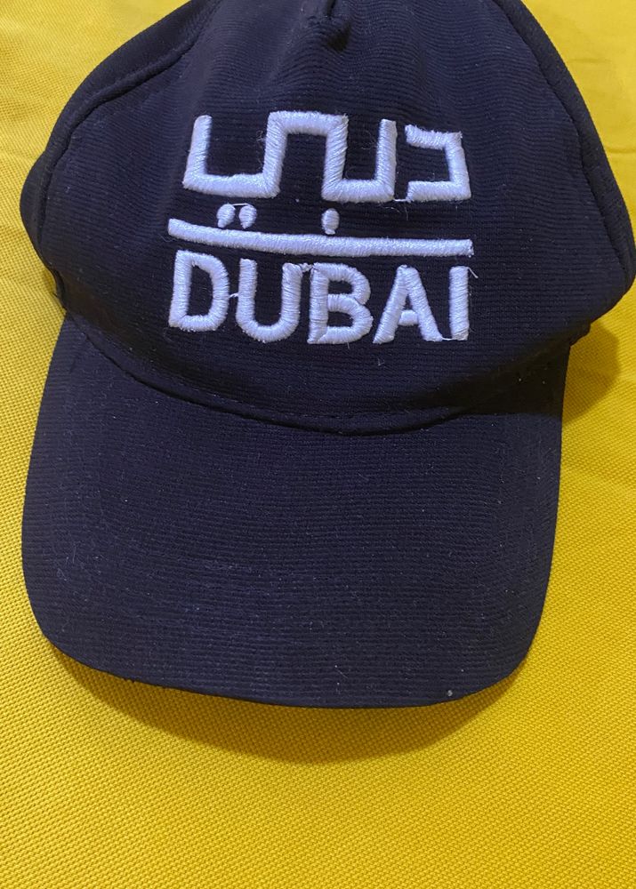 The Original stretchable “DUBAI”  hat featuring stretchable sweatband technology is a perfect blend of style.