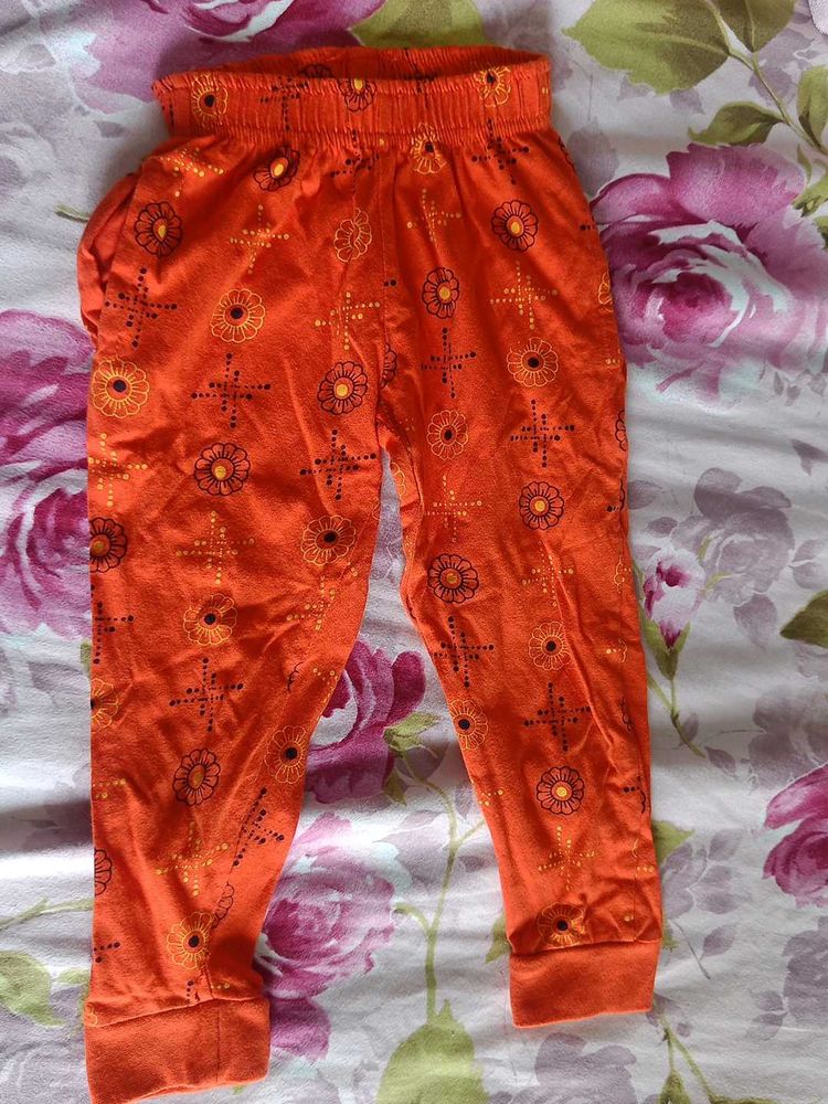 Orange Pants With Flower Print