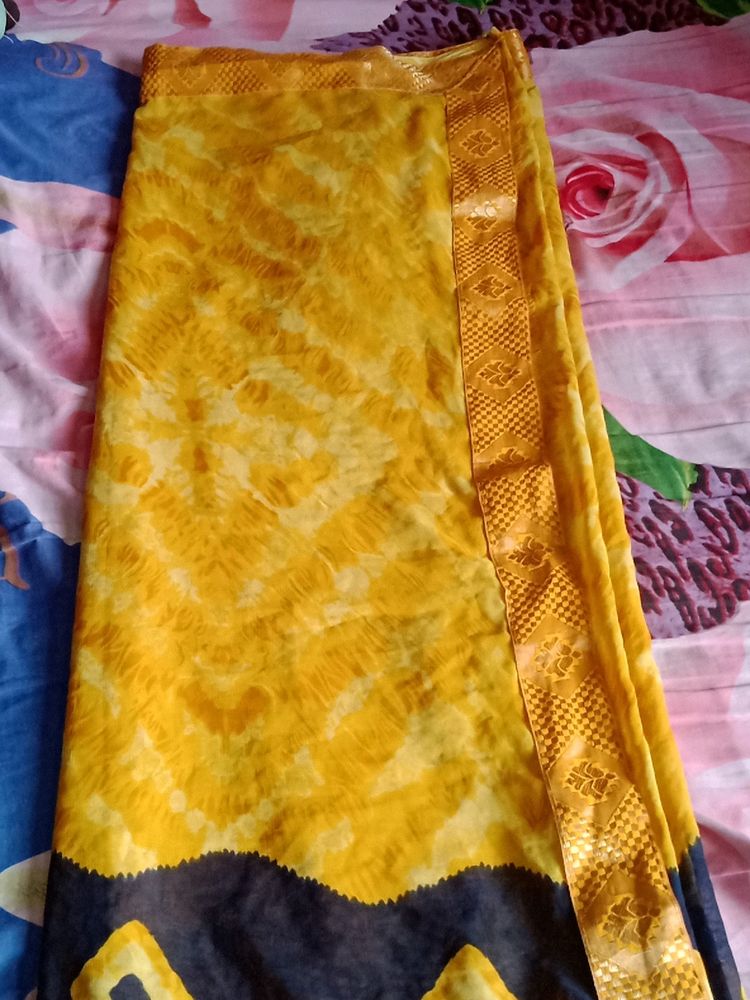 new printed saree with raining blouse piece