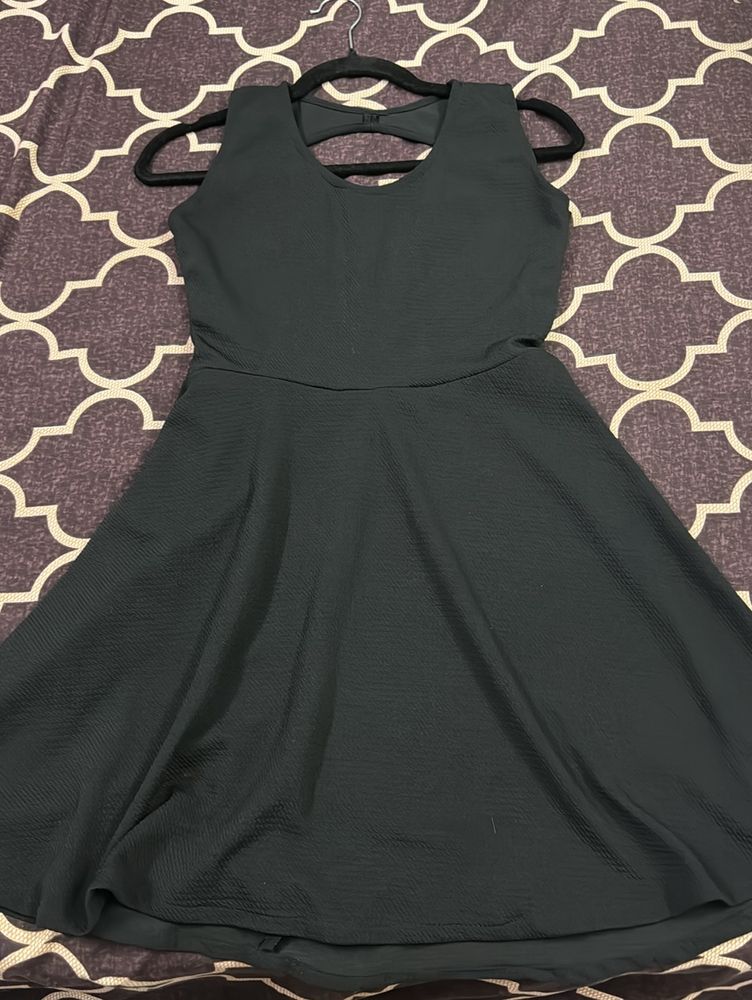 Black Flared Dress With Back Cutout