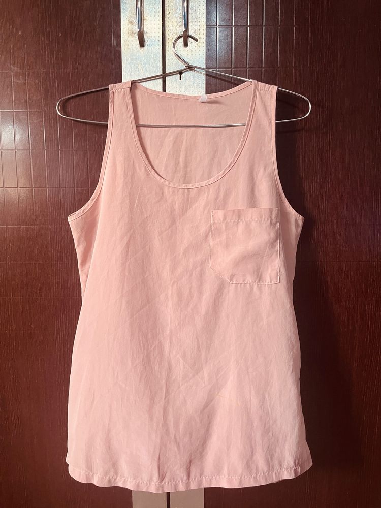 A Peach Colour Top.  Size:M.