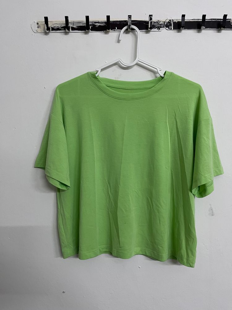 .green crop top