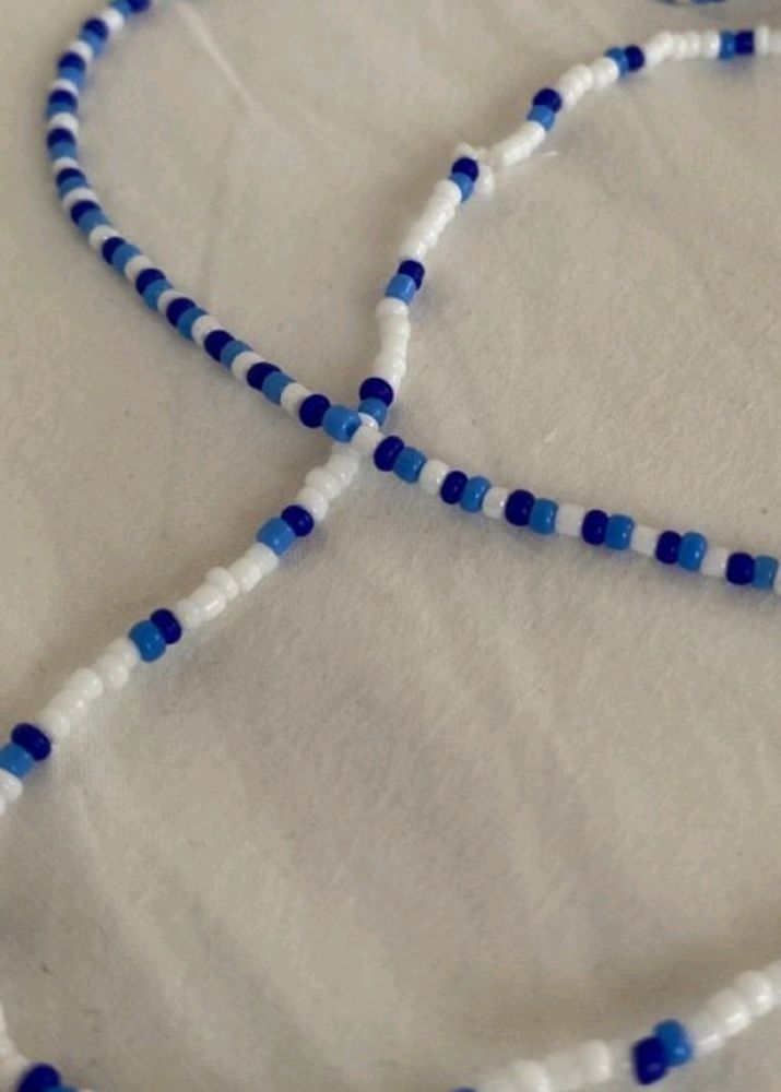 2 BLUE AND WHITE BEADED BRACELET