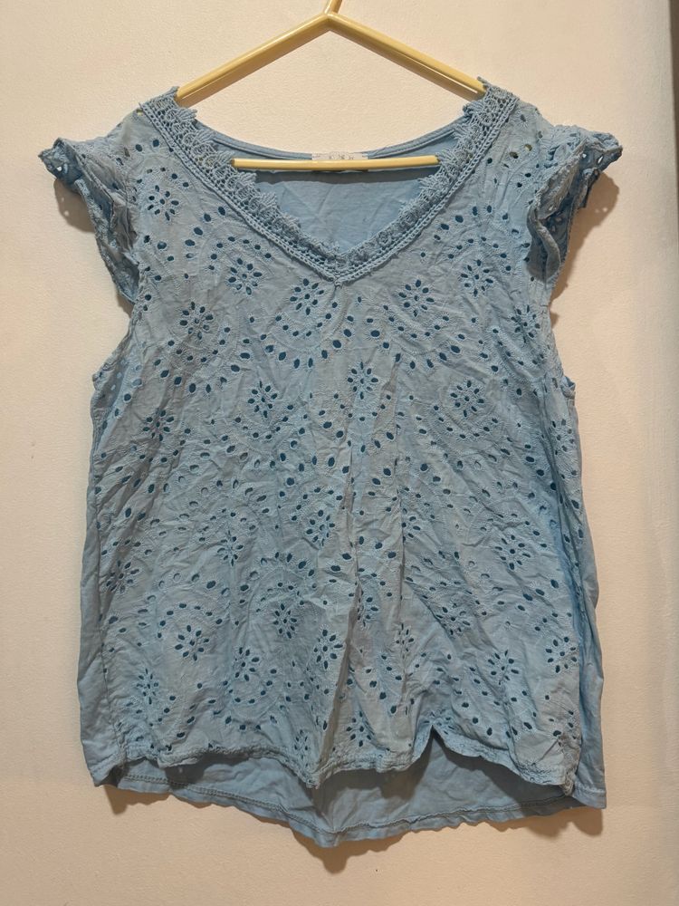 A Baby Blue Net Design Top