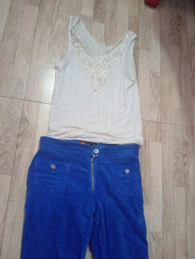 Blue Bell Bottom Jeans And White Tank Top