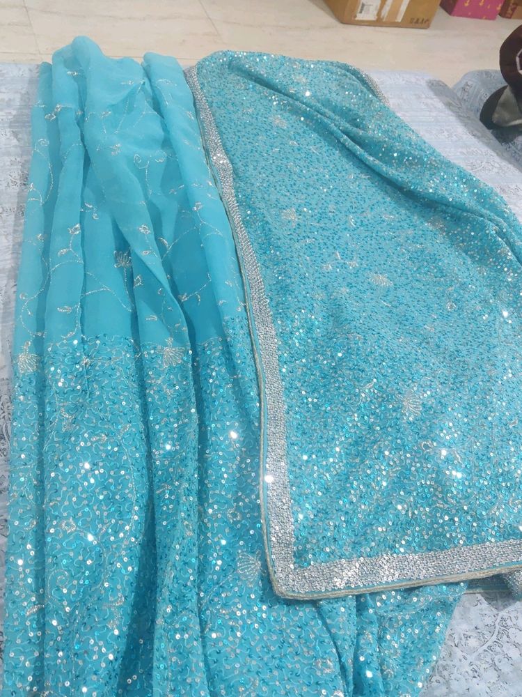 Pure Georgette Blue Heavy Sequence Saree