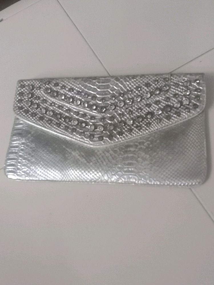 Diamonds embellished silver classic clutch