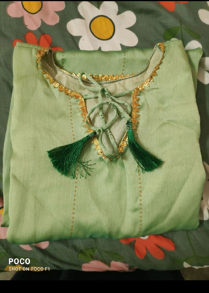 pretty pista green long kurti.