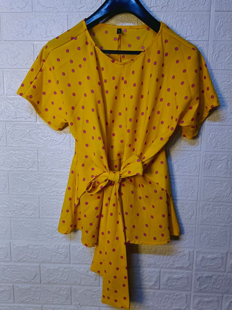 "Sunny Chic: Yellow Polka Dot Top with Tie-Up Bow"