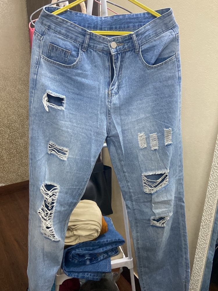 Urbanic ripped straight fit jeans.