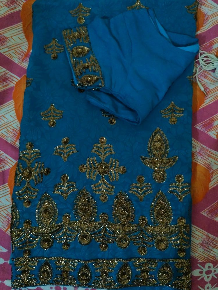 Peacock Blue Georgette Saree With Stitched Blouse