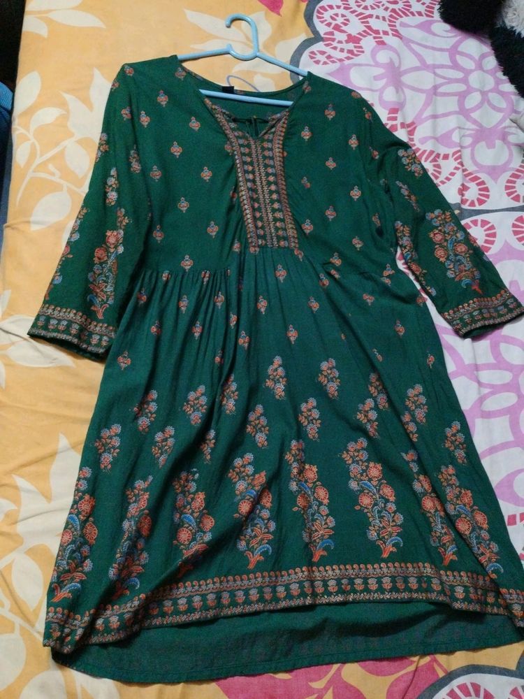 A Dark Green Kurti