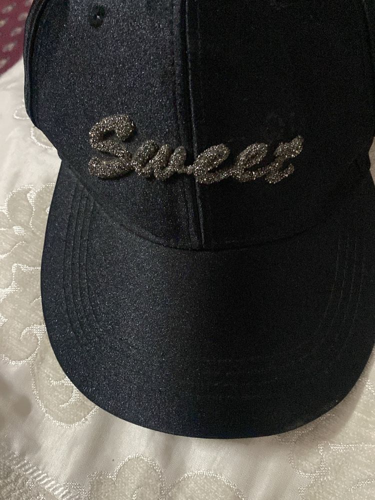 Black cap with sparkly