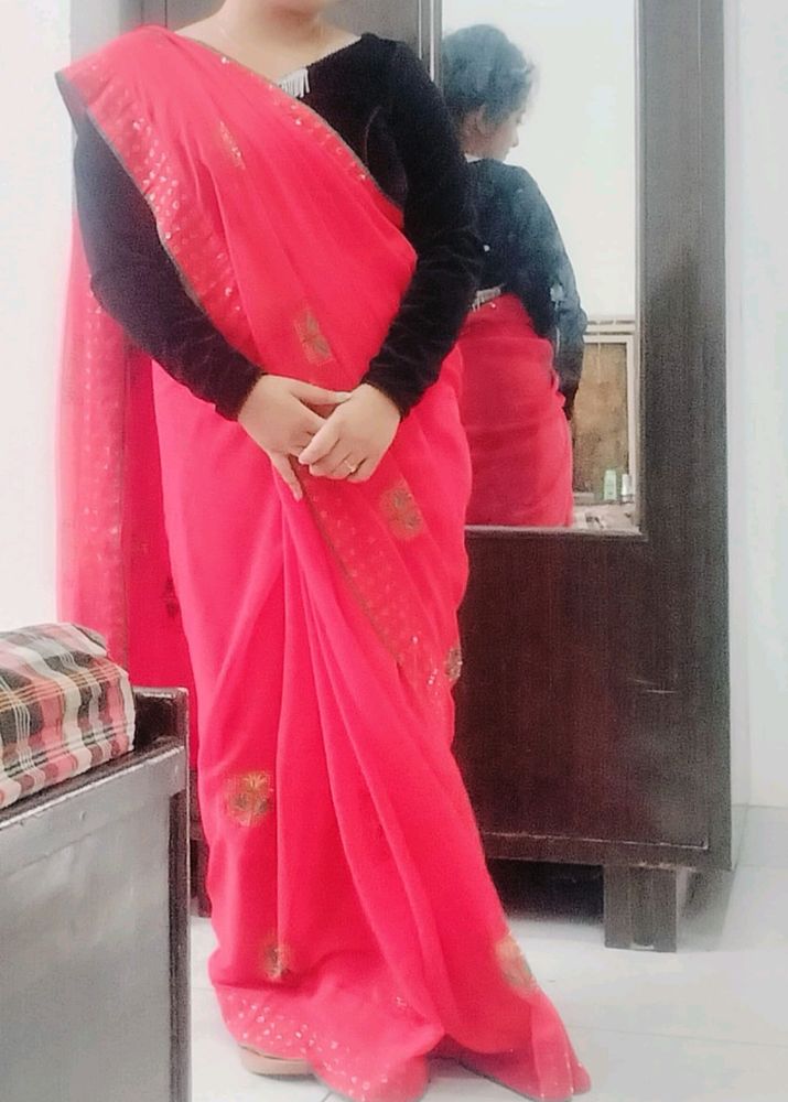 Red Saree With Its Blouse And Peticoat