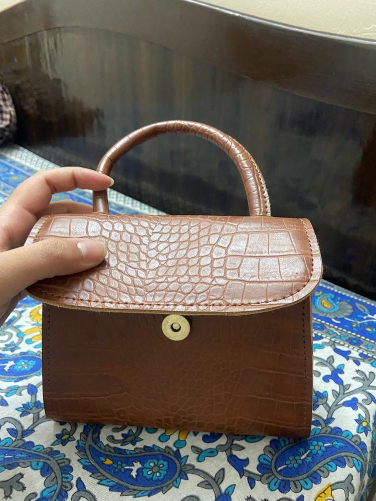 Brown Purse And Sling Bag