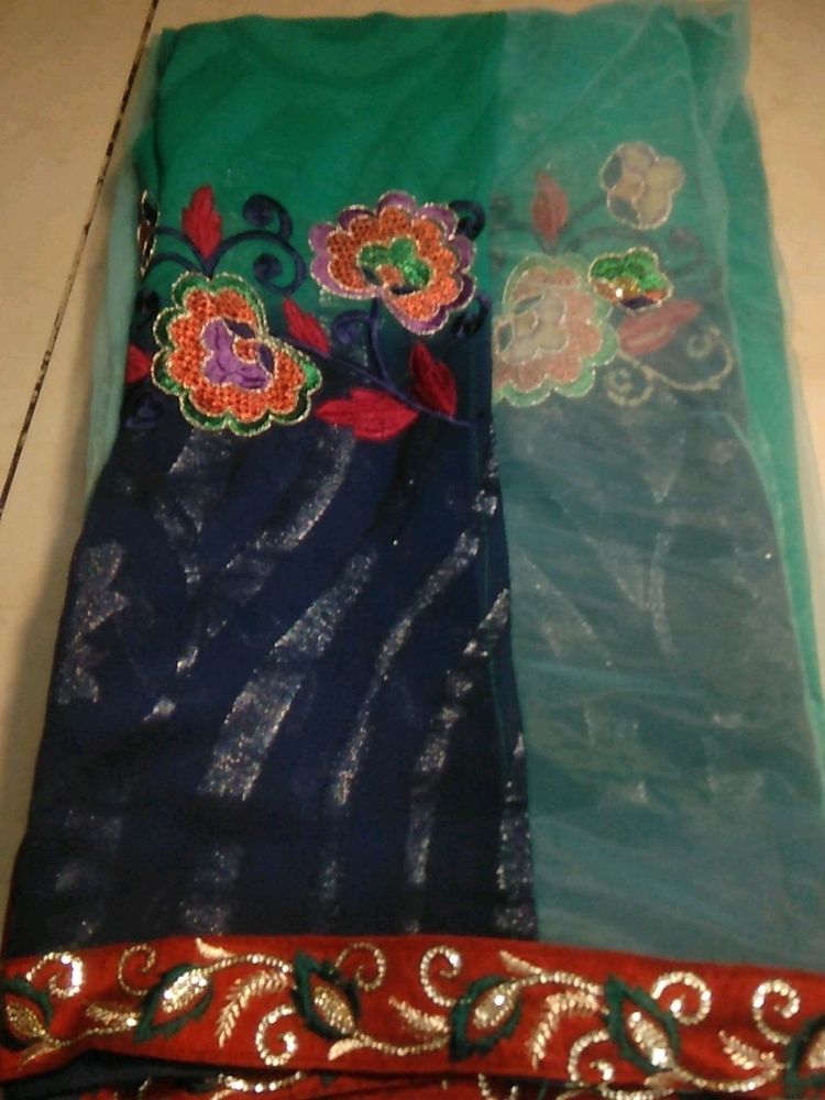 Half-georgette, Half-net. Festive Saree