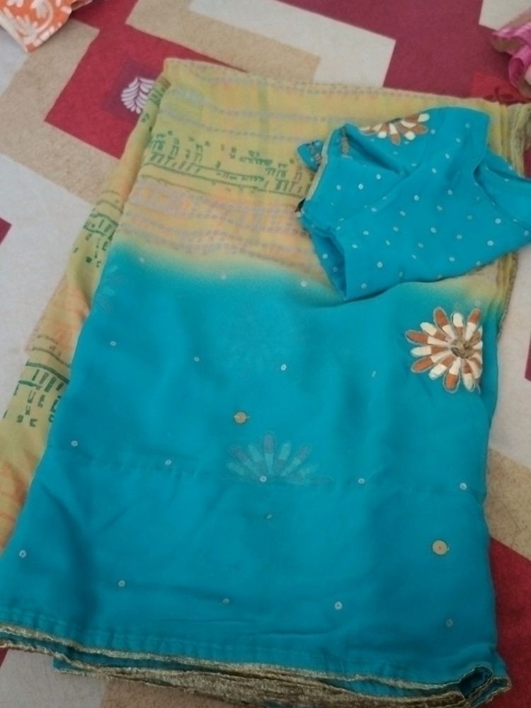 Saree With Stitched Blouse