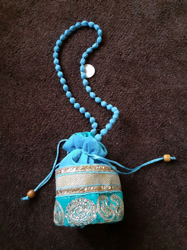 BeautifulPotli Bag💙 And A Pair Of Golden Bangles