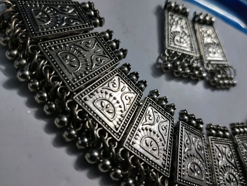 Combo Of One Black Metal Necklace With Earings And A Set Of Silver Bangles