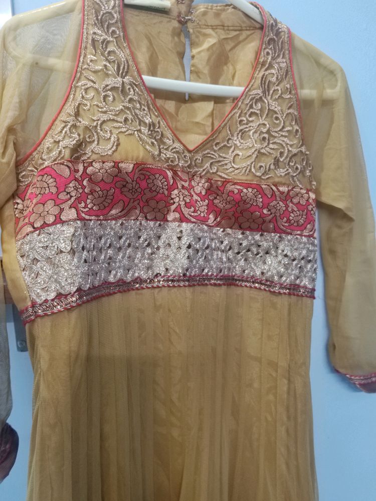 It's golden color anarkali. L size