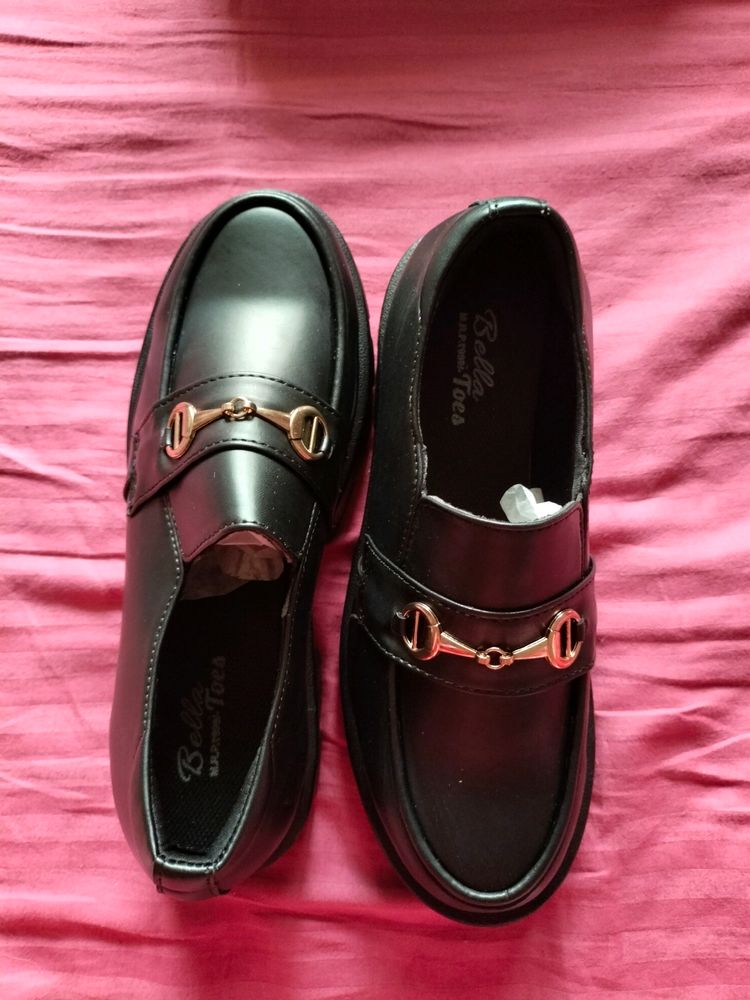 Black Heeled Horsebit Loafers